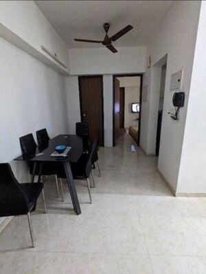 Living Room in 1 BHK Apartment at Lodha Amara, Kolshet Road – for Sale