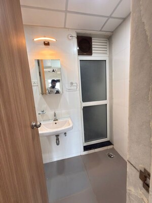 Bathroom in 2 BHK Apartment at Godrej Emerald, Ghodbunder Road – for Rent