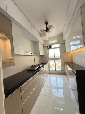 Kitchen in 2 BHK Apartment at Godrej Emerald, Ghodbunder Road – for Rent