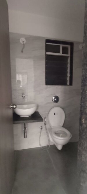 Bathroom in 1 BHK Apartment at Anant Metropolis Insignia Towers, Kasarvadavali – for Rent