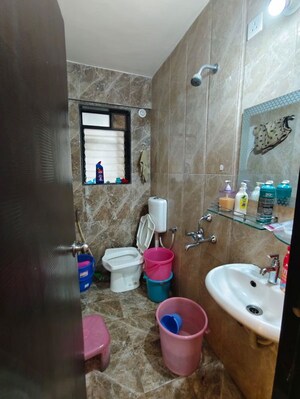 Bathroom in 3 BHK Apartment at Haware Dahlia, Kasarvadavali – for Rent