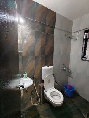 Bathroom in 3 BHK Apartment at Haware Dahlia, Kasarvadavali – for Rent