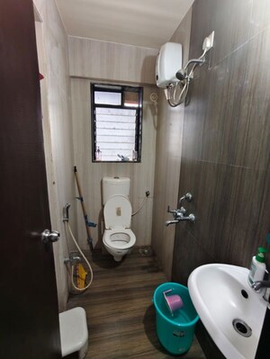 Bathroom in 3 BHK Apartment at Haware Dahlia, Kasarvadavali – for Rent