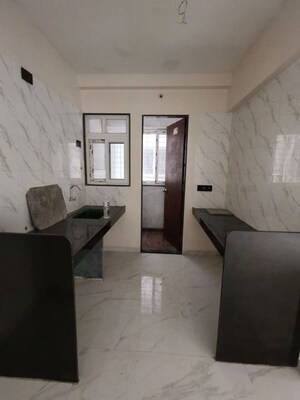 Kitchen in 2 BHK Apartment at Chinar CHS, Kothrud – for Rent