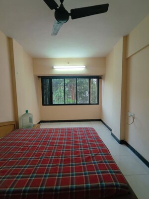 Bedroom in 3 BHK Apartment at Nayana Niwas, Borivali West – for Rent
