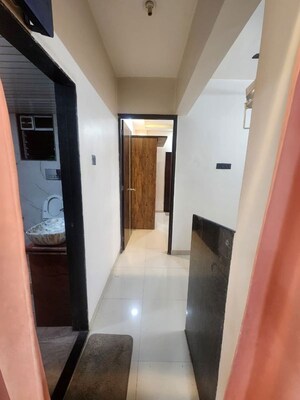 Building Lobby in 2 BHK Apartment at Progressive Meera Aangan, Ulwe – for Rent
