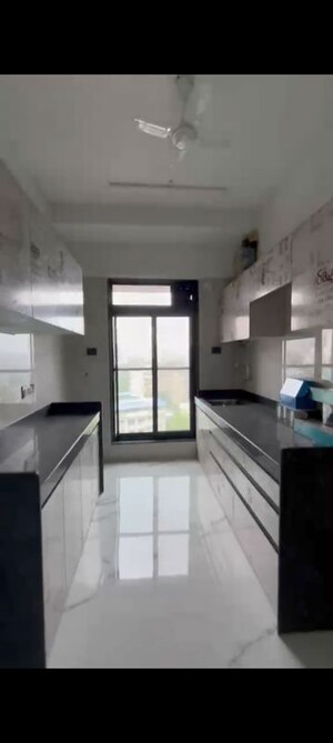Kitchen in 3 BHK Apartment at H Rishabraj Serenity Decks, Goregaon East – for Rent