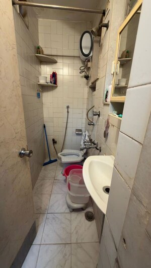Bathroom in 1 BHK Apartment at New Devrup, Daulat Nagar – for Rent