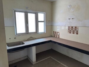 Kitchen in 5 BHK Apartment at UPAVP Ganga Yamuna And Hindon Enclave, Pratap Vihar – for Sale