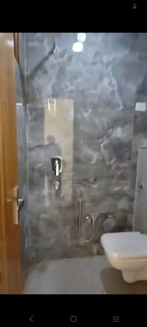 Bathroom in 4 BHK Builder Floor at Mahavir Enclave – for Sale