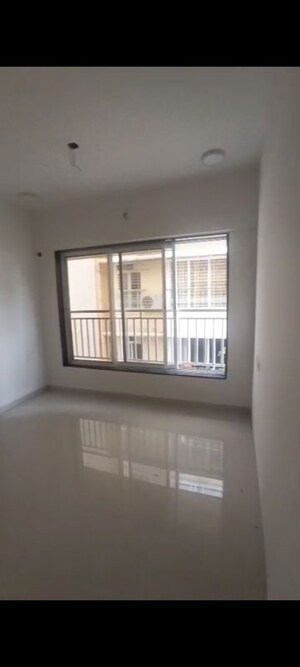 Room in 1 BHK Apartment at Vardhman Om Shri Ganesh CHS, Kandivali West – for Sale