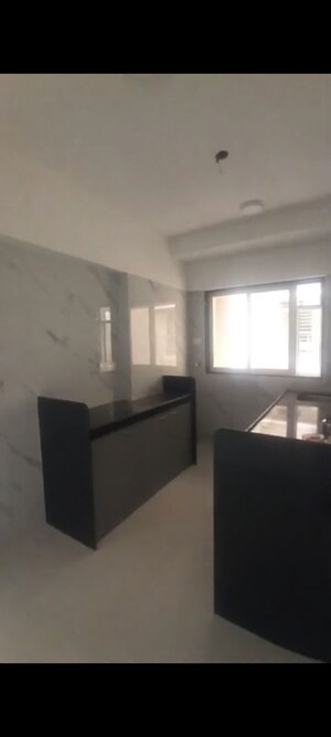 Kitchen in 1 BHK Apartment at Vardhman Om Shri Ganesh CHS, Kandivali West – for Sale