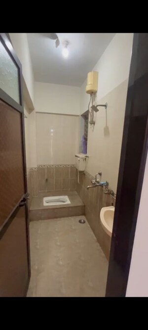 Bathroom in 1 BHK Apartment at Kesar Residency, Kandivali West – for Rent