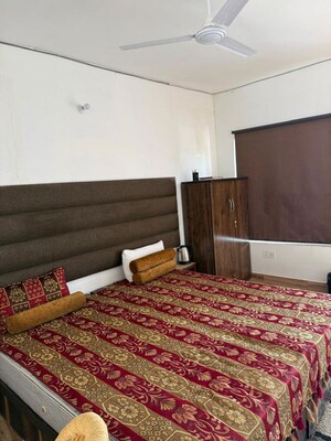 Bedroom in 3 BHK Builder Floor at Guru Nanak Enclave, Dhakoli – for Rent