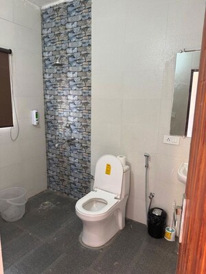 Bathroom in 3 BHK Builder Floor at Guru Nanak Enclave, Dhakoli – for Rent