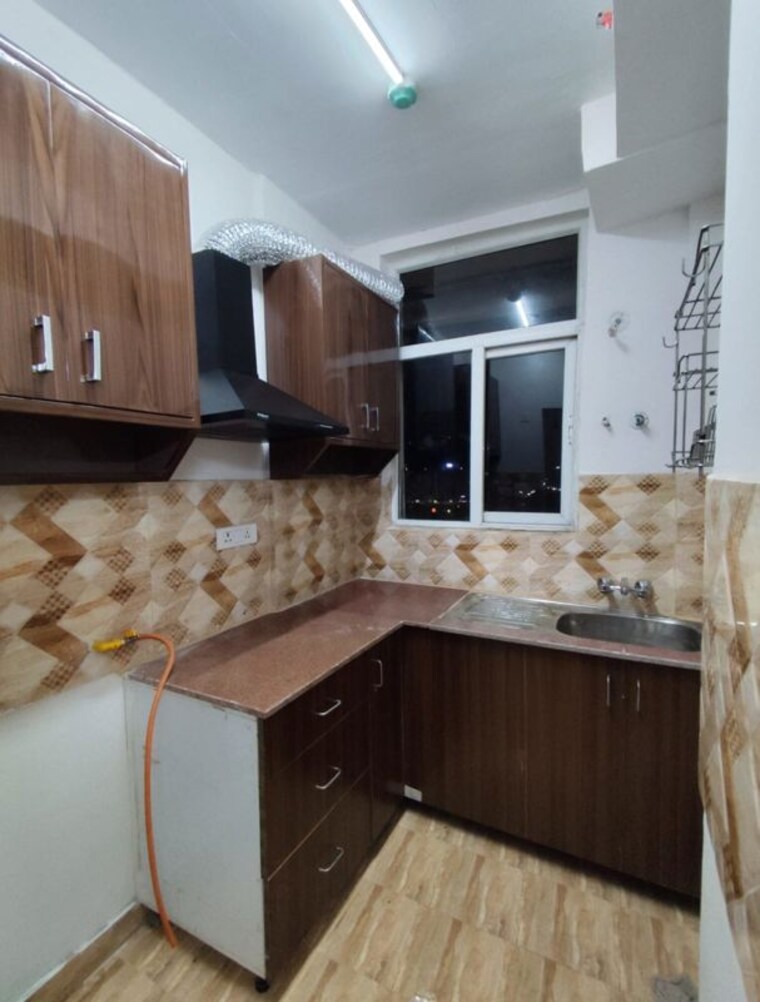 Kitchen, amrapali-riverview 2.5 Bedroom 955 Sq.Ft. Apartment In Amrapali Leisure Valley Greater Noida 10616836