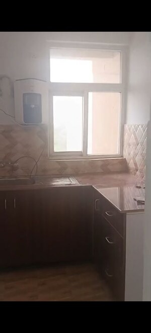 Kitchen in 2 BHK Apartment at Amrapali Leisure Park, Amrapali Leisure Valley – for Sale