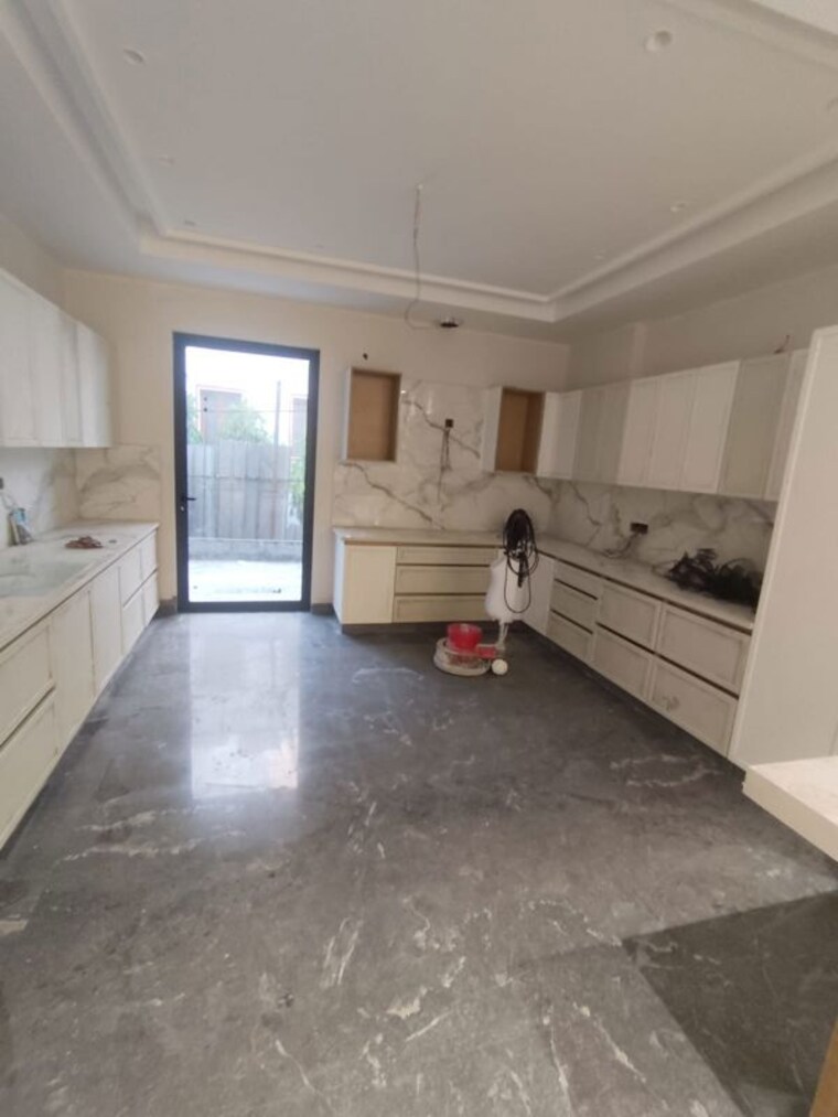 Kitchen, paschim vihar 4 Bedroom 300 Sq.Yd. Builder Floor In Paschim Vihar Delhi 10607311