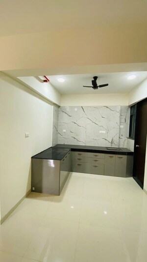 Kitchen in 2 BHK Apartment at Bhumi Silverio, Chikhali – for Rent