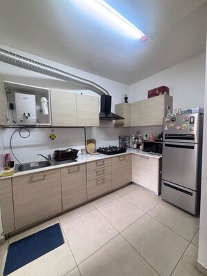 Kitchen in 2 BHK Apartment at Bhartiya Nikoo Homes Phase 2, Thanisandra Main Road – for Rent