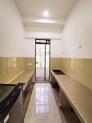 Kitchen in 2 BHK Apartment at Divine Park 55, Shivaji Park – for Sale