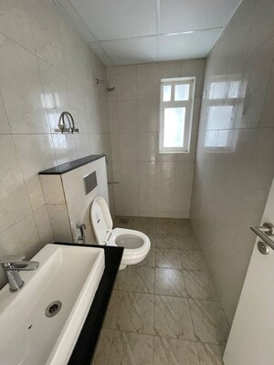 Bathroom in 2 BHK Apartment at Shapoorji Pallonji Joyville Hinjewadi, Hinjewadi – for Rent