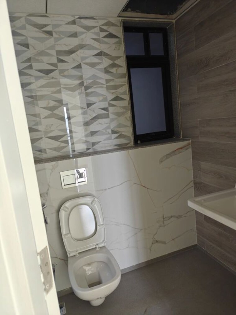 Bathroom, kumar-47-east-a 2 Bedroom 850 Sq.Ft. Apartment In Magarpatta City Pune 10617089