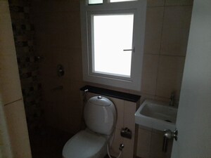 Bathroom in 2 BHK Apartment at Brigade Bricklane, Jakkuru – for Rent