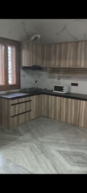 Kitchen in 3 BHK Builder Floor at Omaxe NRI City Center, Omega Ii Greater Noida – for Rent