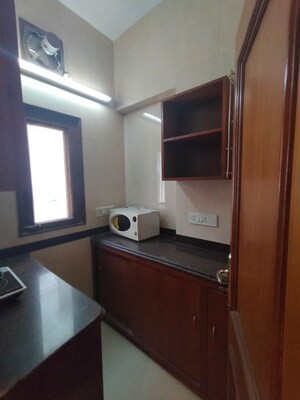 Kitchen in Studio Apartment at Defence Colony – for Rent