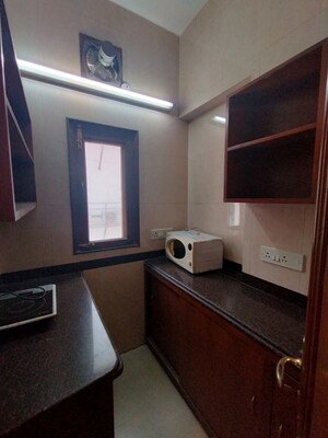 Kitchen in Studio Apartment at Defence Colony – for Rent