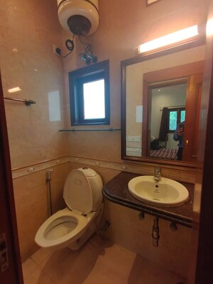 Bathroom in Studio Apartment at Defence Colony – for Rent