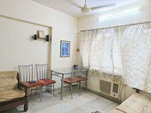 Living Room in 1 BHK Apartment at Hiranandani Gardens, Powai – for Rent