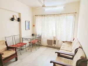 Living Room in 1 BHK Apartment at Hiranandani Gardens, Powai – for Rent