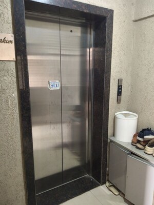 Bathroom in 1 BHK Apartment at Andheri CHS, Andheri West – for Rent