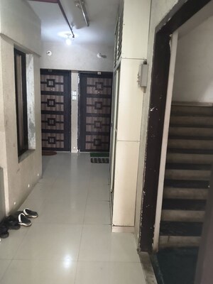 Building Lobby in 1 BHK Apartment at Andheri CHS, Andheri West – for Rent