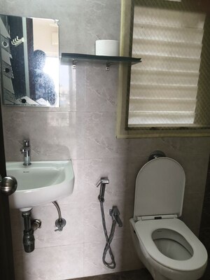 Bathroom in 1 BHK Apartment at Andheri CHS, Andheri West – for Rent