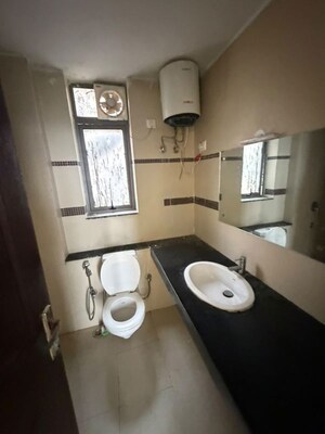 Bathroom in 2 BHK Apartment at Unitech Uniworld Gardens, Sector 47 – for Rent