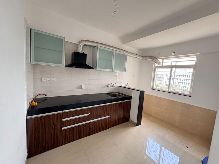 Kitchen, manav-wild-woods 2 Bedroom 673 Sq.Ft. Apartment In Wagholi Pune 10617452