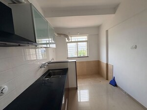Kitchen in 2 BHK Apartment at Manav Wild Woods, Wagholi – for Rent
