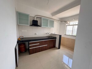 Kitchen in 2 BHK Apartment at Manav Wild Woods, Wagholi – for Rent