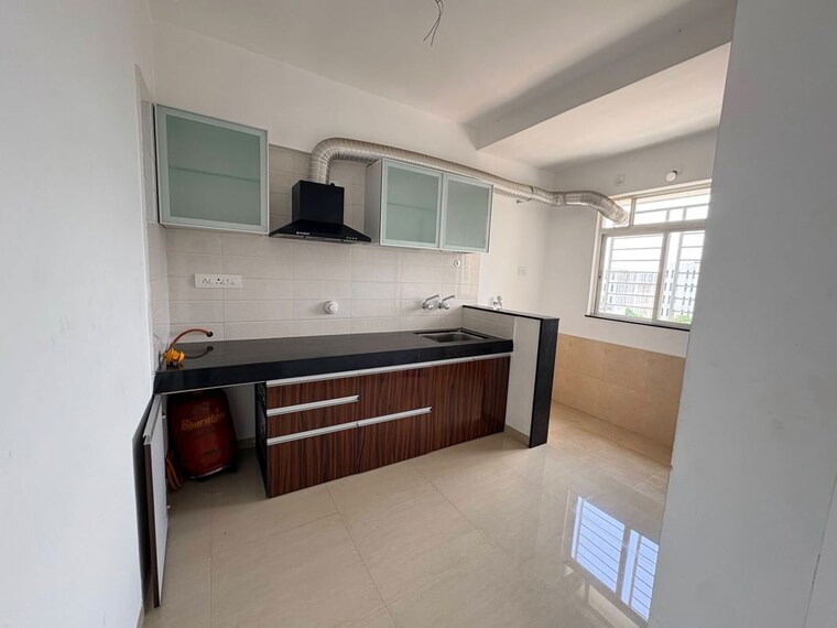 Kitchen, manav-wild-woods 2 Bedroom 673 Sq.Ft. Apartment In Wagholi Pune 10617452