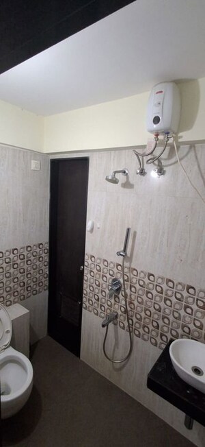 Bathroom in 2 BHK Apartment at The Baya Goldspot, Andheri East – for Rent
