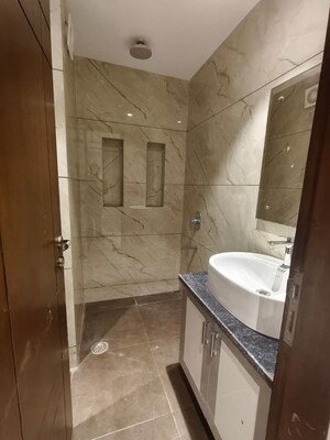 Bathroom in 4 BHK Apartment at Freedom Fighters Enclave – for Rent
