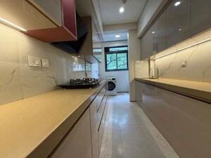 Kitchen in 3 BHK Apartment at Rustomjee Seasons, Bandra East – for Rent
