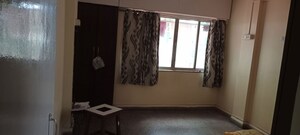 Bedroom in 2 BHK Apartment at Kumbare Park Society, Kothrud – for Rent