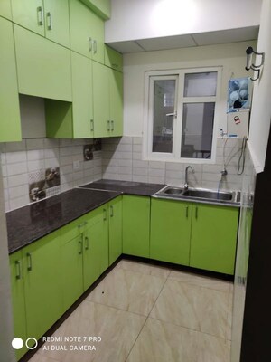 Kitchen in 2 BHK Apartment at Gaur City 7th Avenue, Sector 4 Greater Noida – for Rent