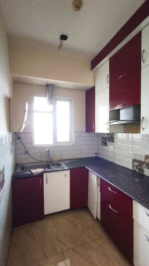 Kitchen in 2 BHK Apartment at Gaur City 7th Avenue, Sector 4 Greater Noida – for Rent