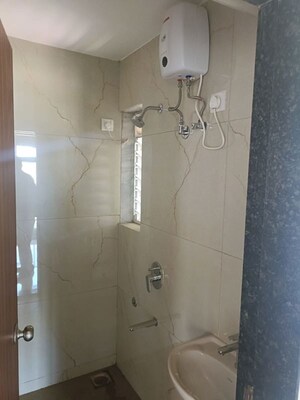 Bathroom in 1 BHK Apartment at Raunak Bliss, Ghodbunder Road – for Rent