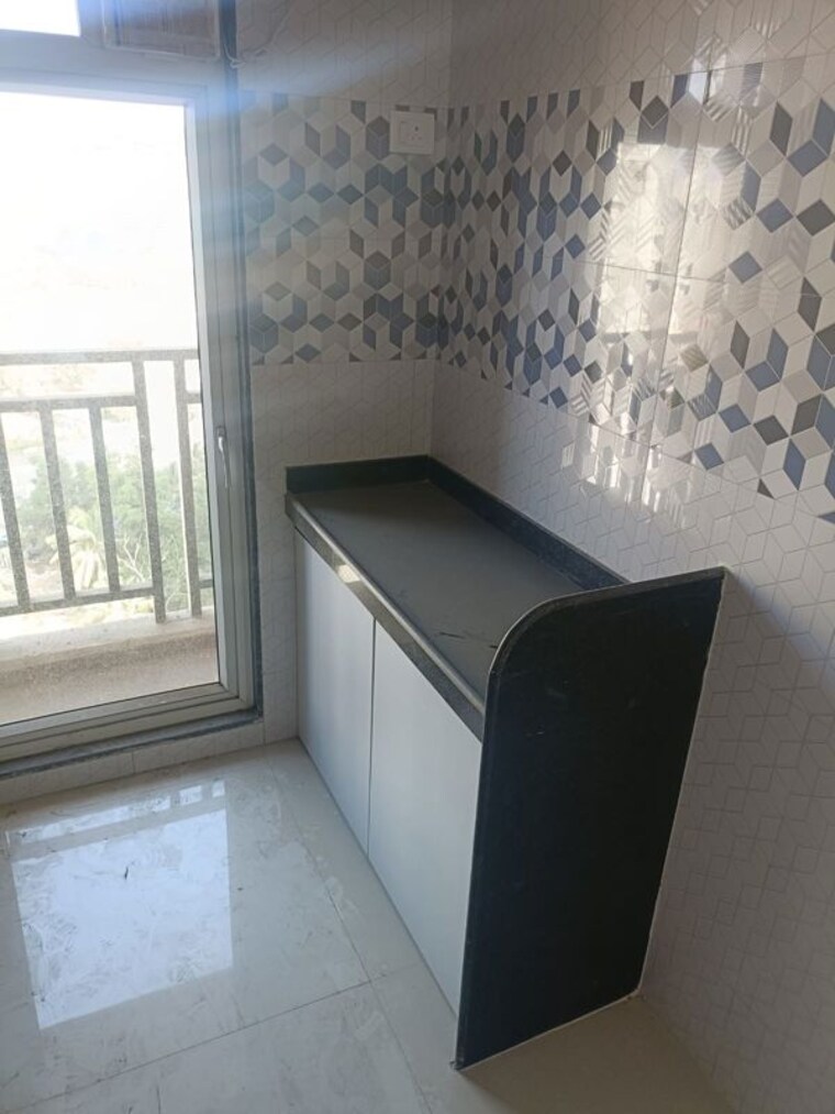 Kitchen, raunak-bliss 1 Bedroom 350 Sq.Ft. Apartment In Ghodbunder Road Thane 10617609